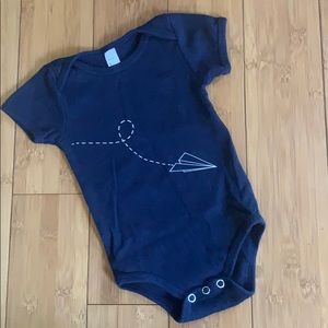 Navy blue paper airplane onesie